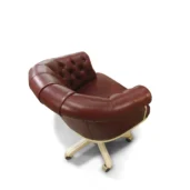 Brown leather presidential armchair with a curved back and buttoned upholstery, mounted on a swivel base with brass casters.